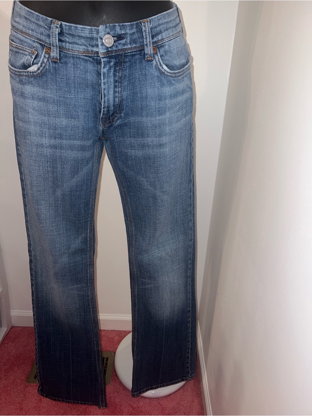 7 For All Mankind blue jeans with brown stitching